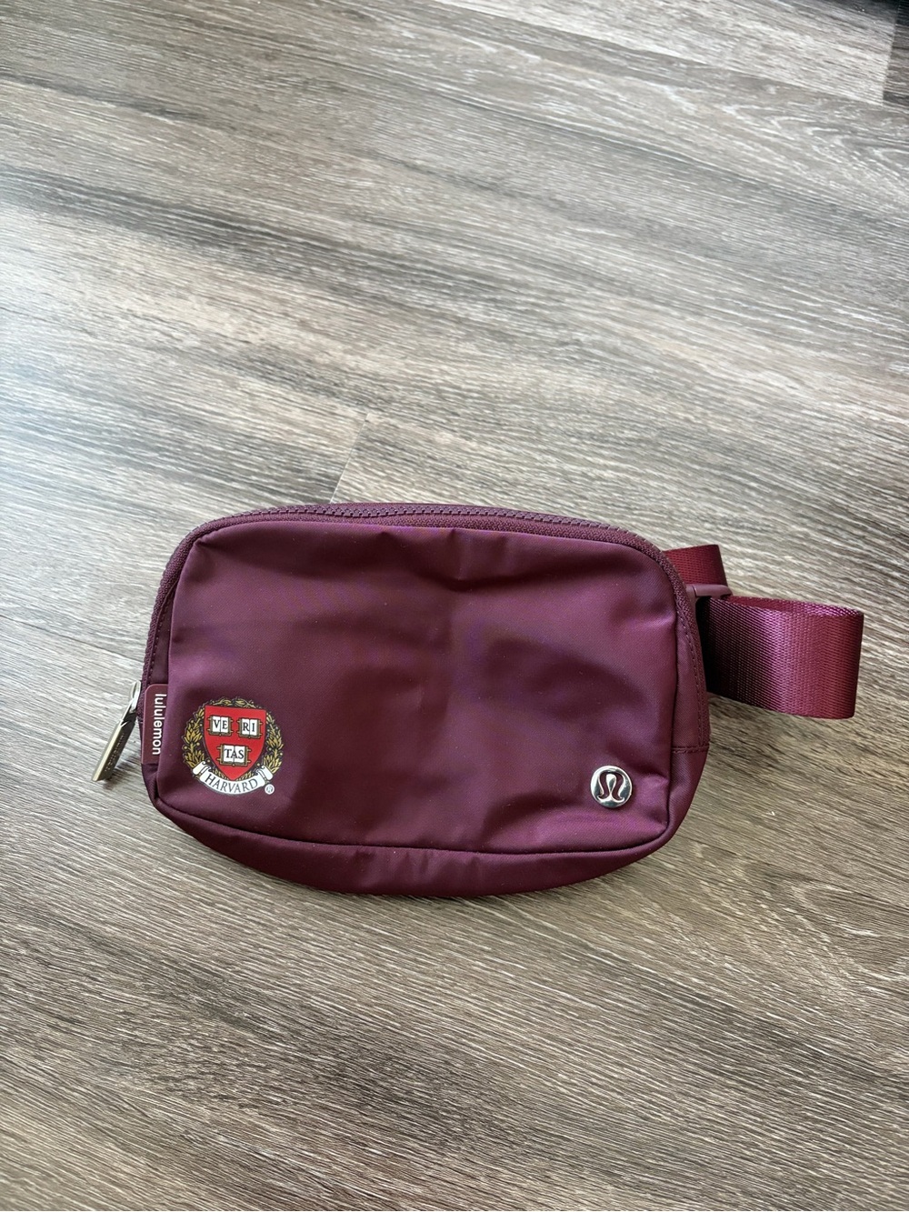 lululemon athletica maroon crossbody bag with Harvard Crest